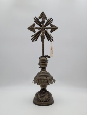 Antique Metal Crucifix With Radiating Sacred Heart Motif On Ornate Base