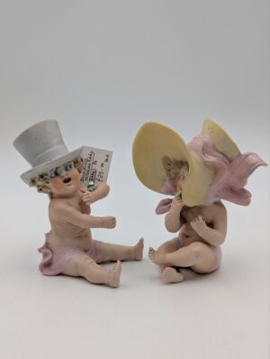 Pair of Victorian Bisque Piano Babies Figures with Hats