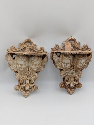 Pair of Antique Cast Iron Cherub Wall Shelves