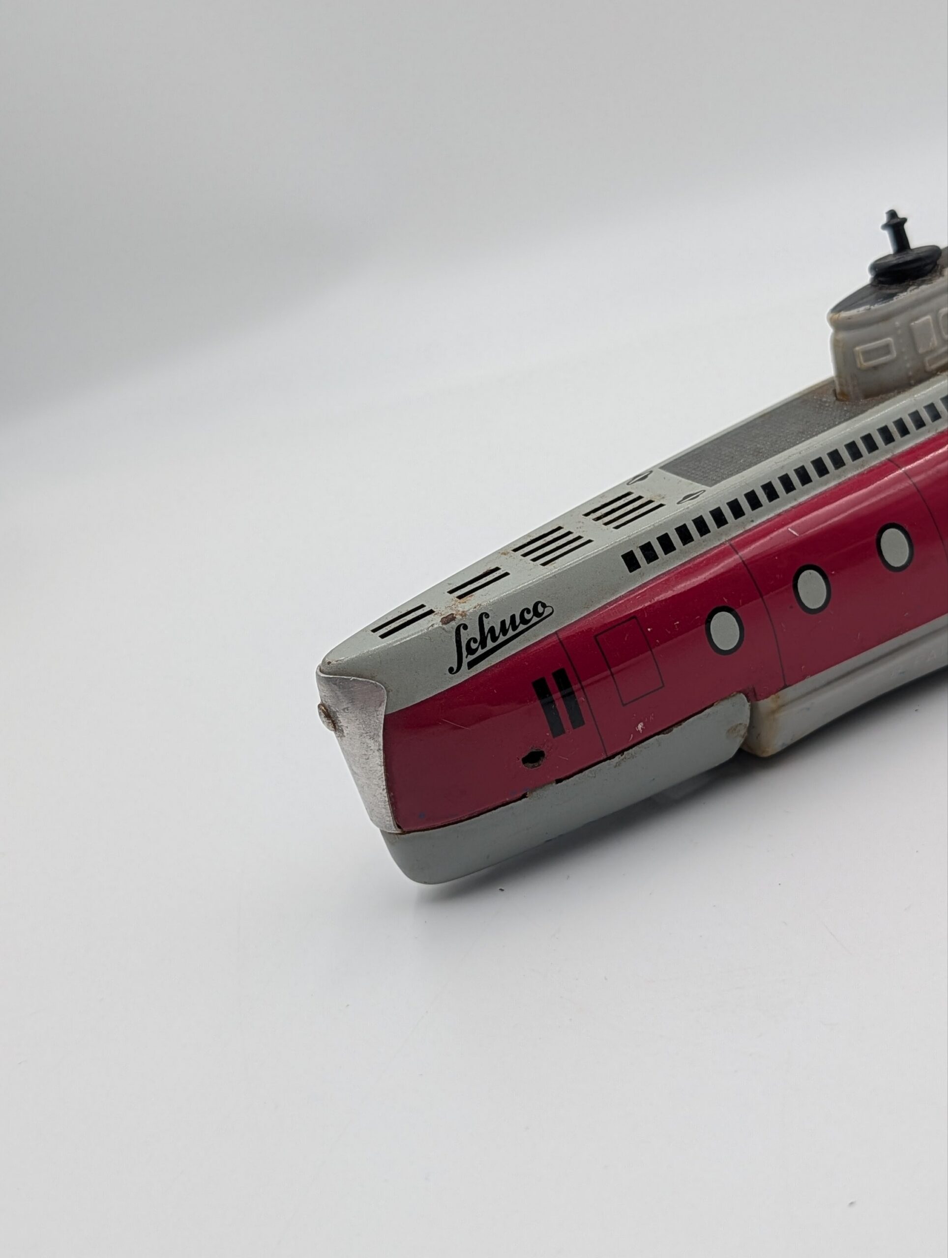 Vintage German Schuco Tinplate Clockwork Submarine – Red & Silver - Image 2