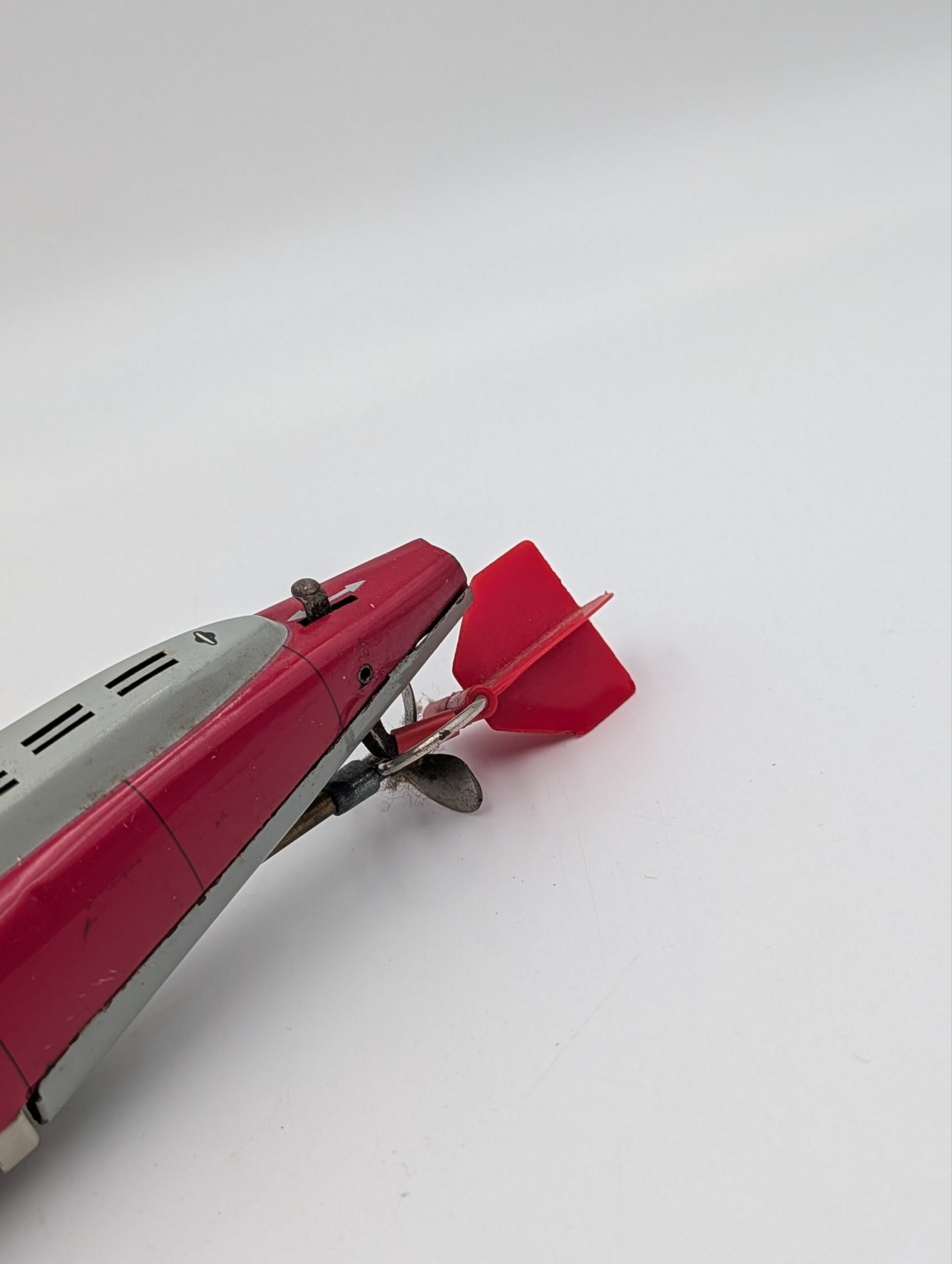 Vintage German Schuco Tinplate Clockwork Submarine – Red & Silver - Image 5