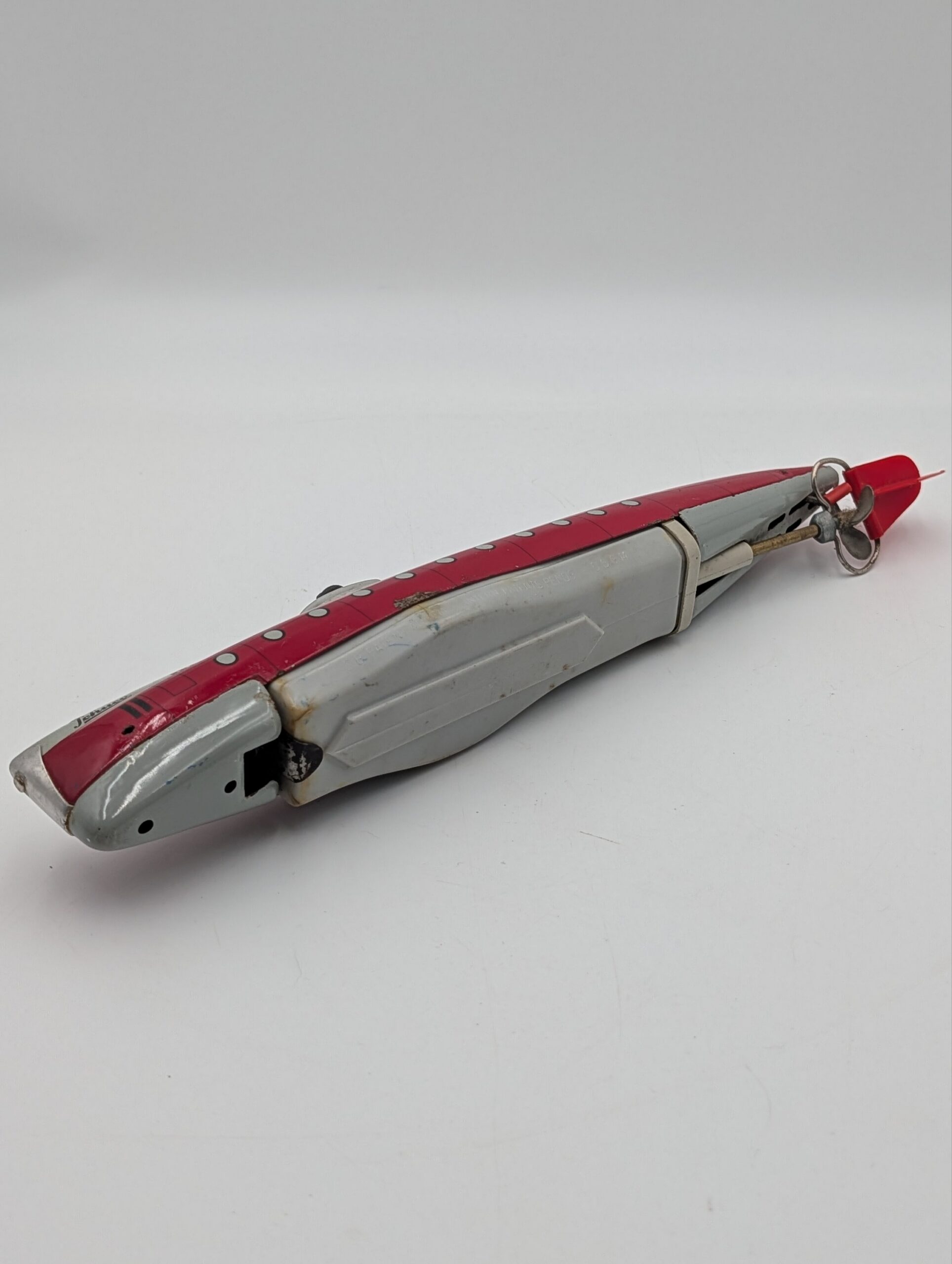 Vintage German Schuco Tinplate Clockwork Submarine – Red & Silver - Image 4