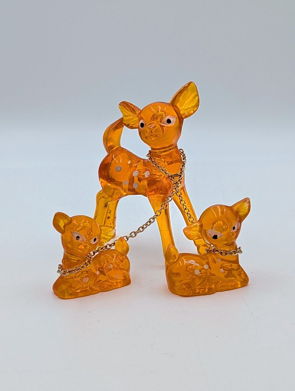 1950s Kitsch Amber Lucite Deer Family Ornament