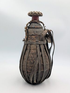 Early 20th Century African Tuareg Leather & Woven Fibre Water Vessel with Cowrie Shell Decoration